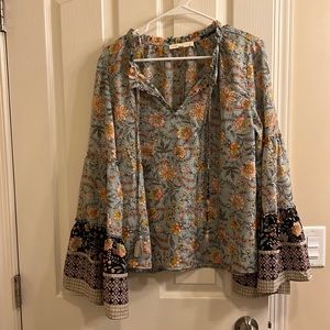 Floral blouse. Size large. Love stitch.
